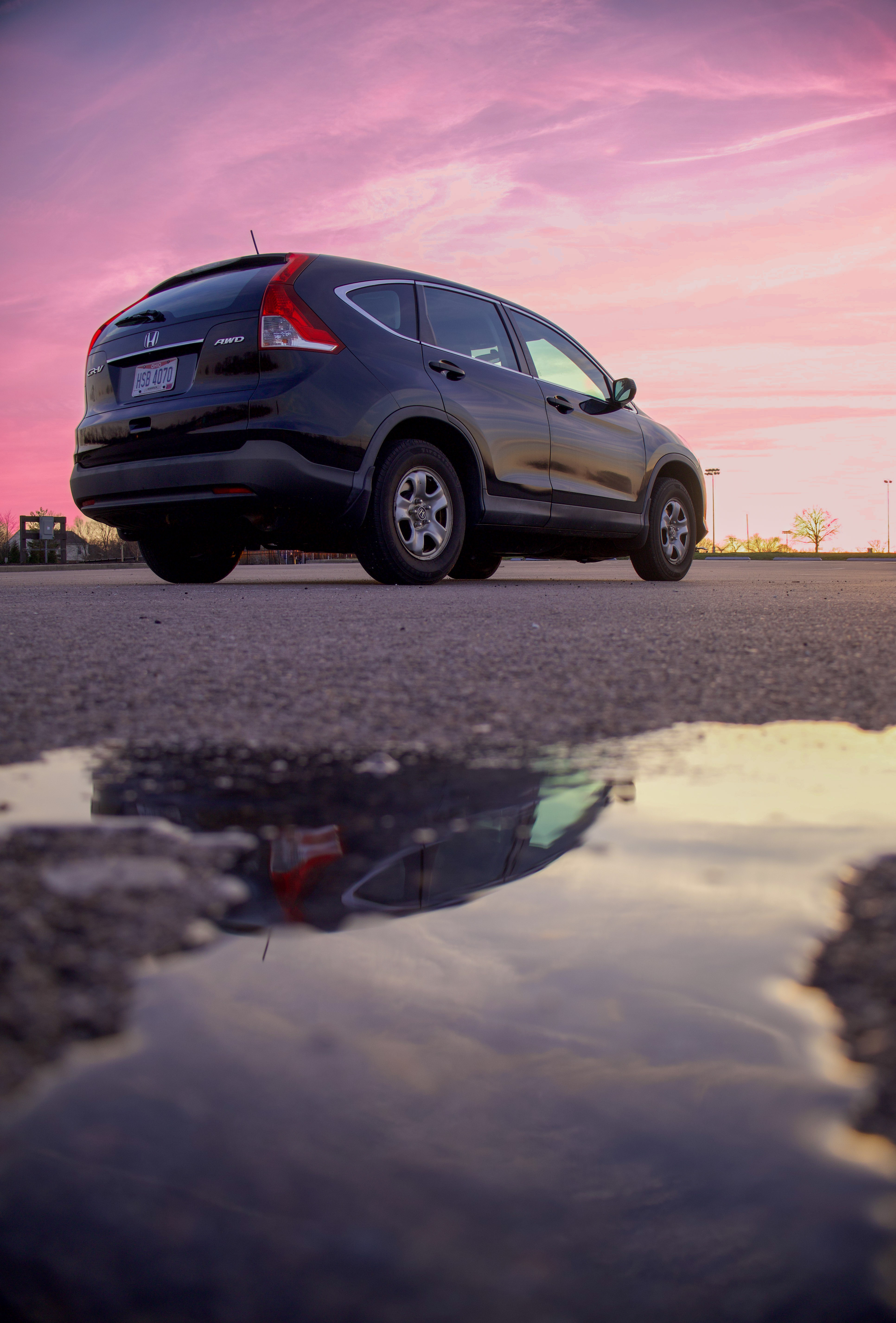 Sunsets over car.
